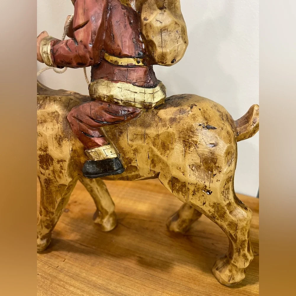 Primitive Folk Art Santa riding Reindeer 12”‎ tall chiseled resin faux wood